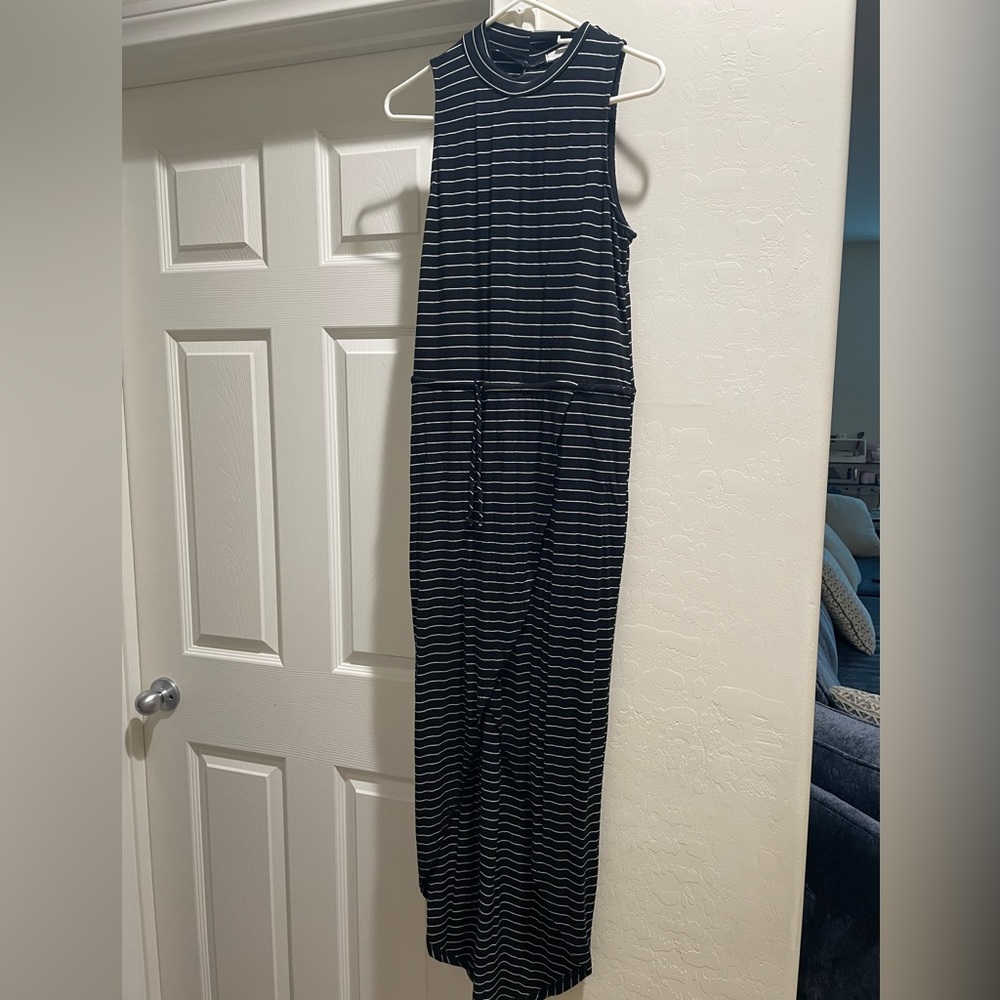 Lush black&white striped Medium striped high-low dress with waist drawstring.